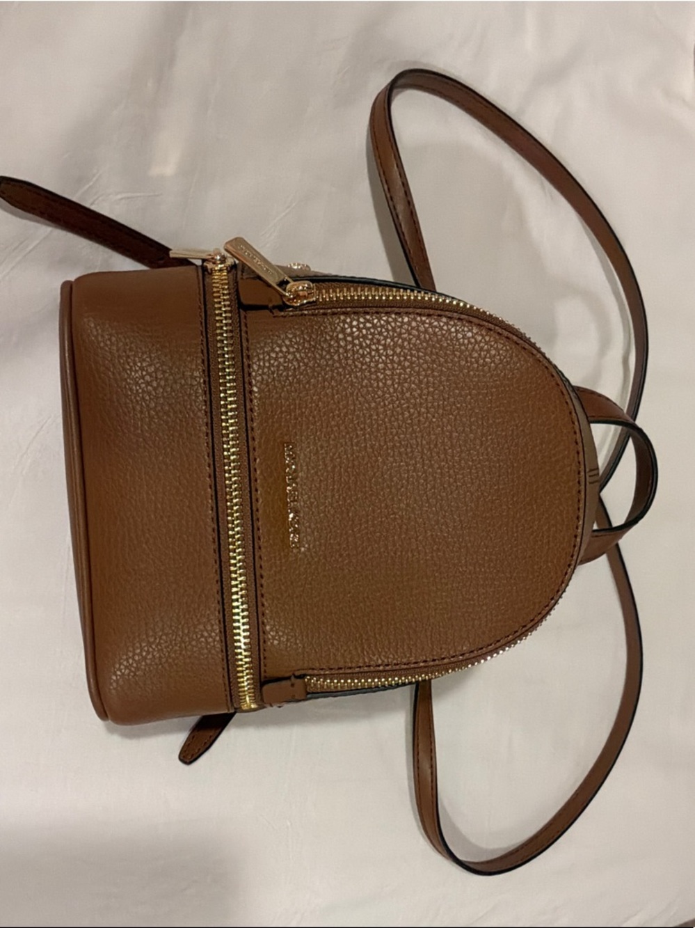Unworn New Michael Kors Cognac Pebbled Leather Mini Backpack with Gold Hardware